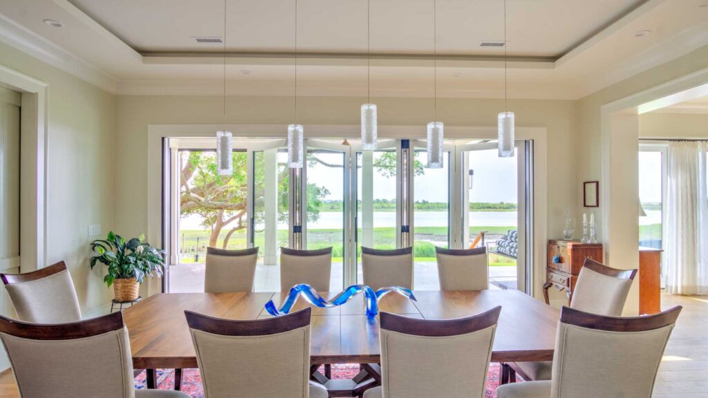 large open accordion-style doors built by homebuilder lanphear builders to take advantage of the coastal views